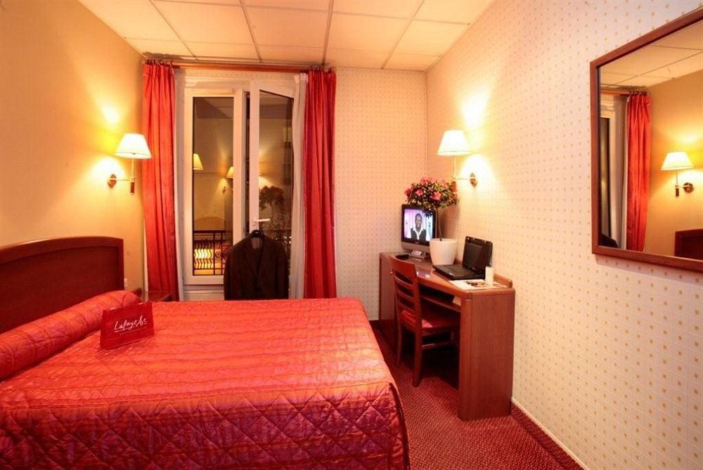 Hotel Charlemagne Нейї-сюр-Сен Номер фото